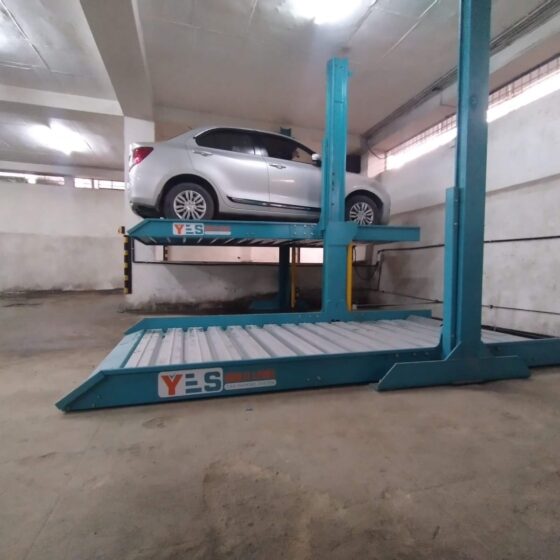 Professional parking system upgrades in Bangalore by Yescarparking, featuring a modern automated car lift being retrofitted for better safety and PLC control.