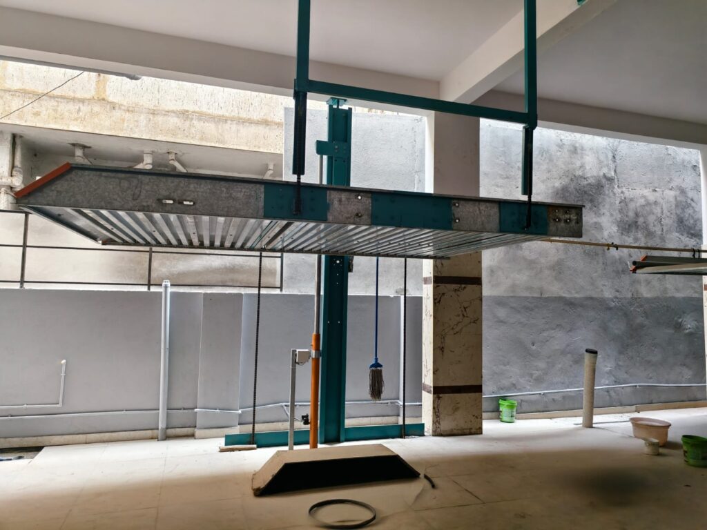 Space-saving single pillar stack parking system in Bangalore installed by Yescarparkinglift for residential villas.